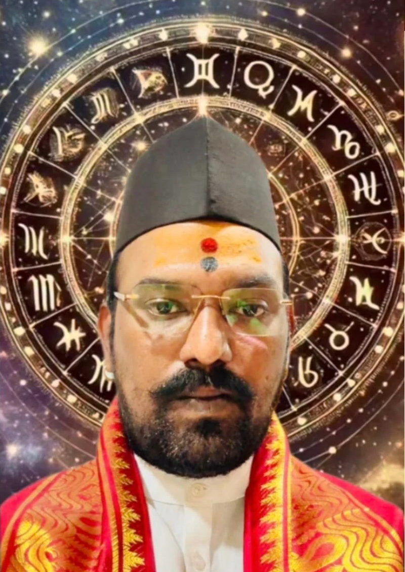 Portrait of our experienced Hindu pandit in traditional attire